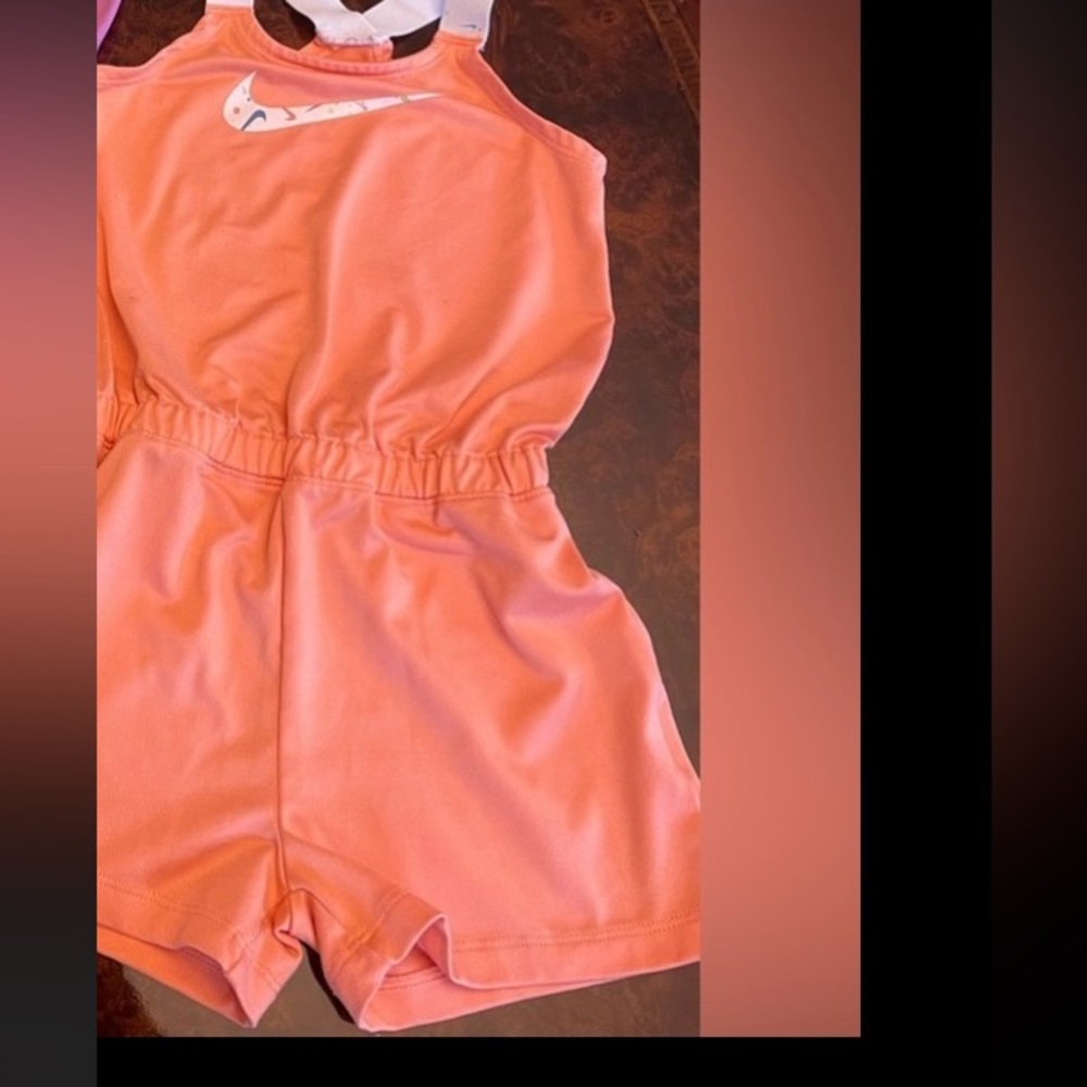 Nike orange peach romper size 4t